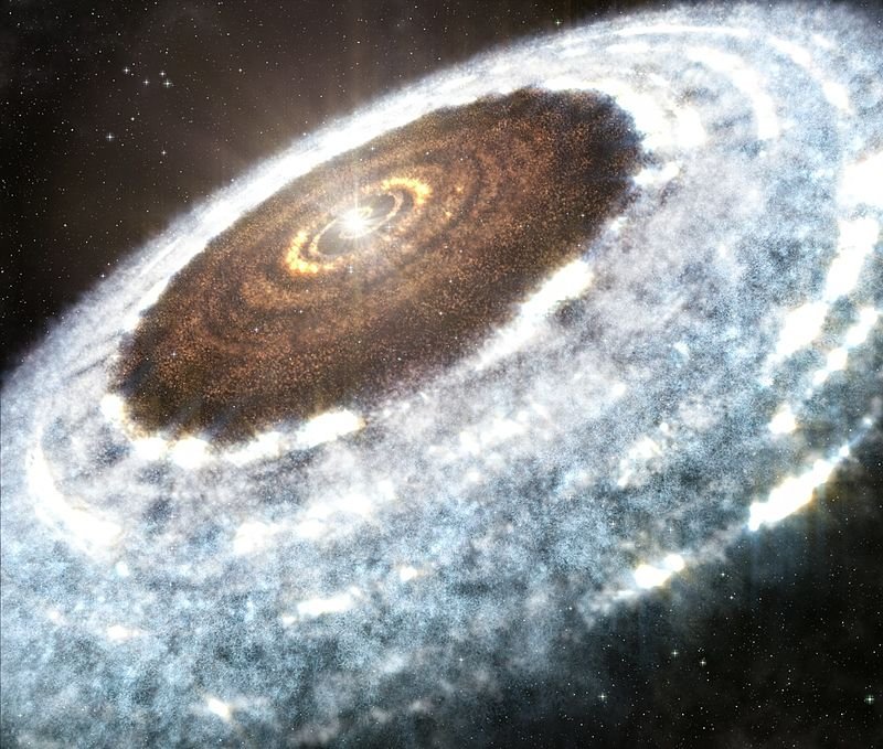 https://aboutspacejornal.net/wp-content/uploads/2021/09/800px-Artist%E2%80%99s_impression_of_the_water_snowline_around_the_young_star_V883_Orionis1.jpg